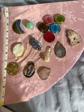 A lot of hard stone pieces, including five glass coin sized discs